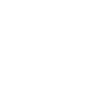 Laptop op bureau met scherm dat WordPress dashboard en mediabibliotheek toont, naast toetsenbord